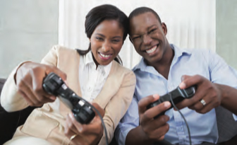 Couple playing a console game